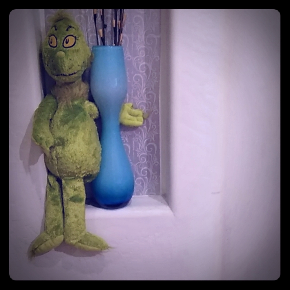 Stuffed Grinch doll.